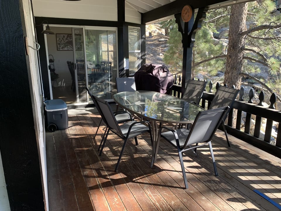 Outdoor dining area with Weber Grille 