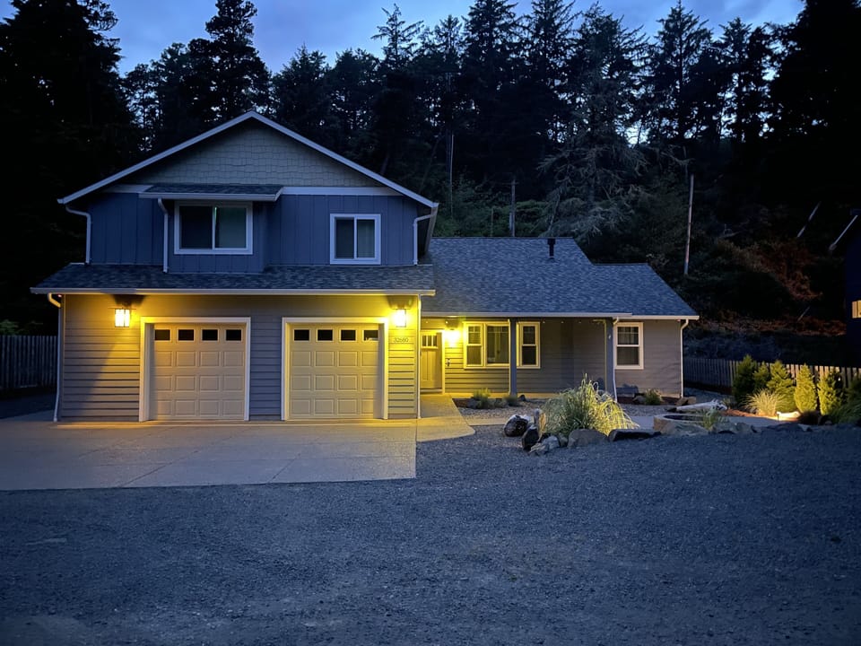 Porch and front of garage lights are on an  automatic timer.