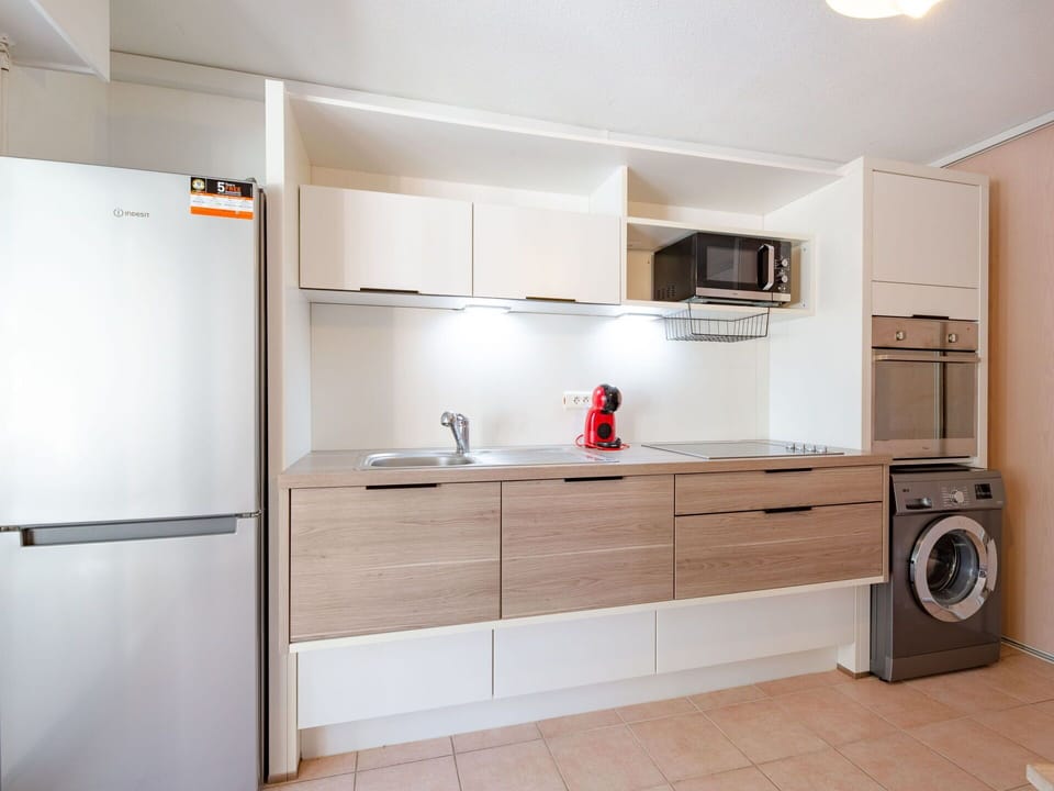 Cabinetry, Countertop, Building, Kitchen Appliance, Kitchen Stove, Kitchen, Home Appliance, Wood, Interior Design, Flooring