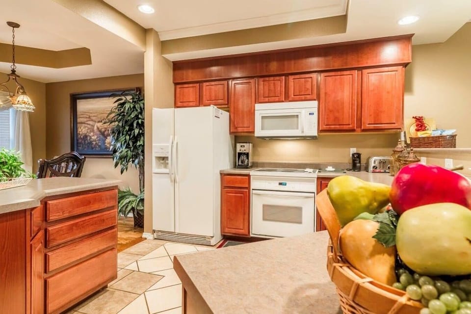 Kitchen includes an island for additional space.