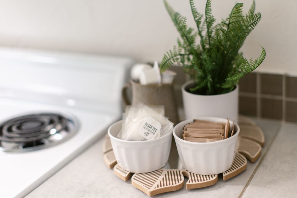 Sweeten your morning with complimentary sugar and creamer, making your perfect cup of coffee complete.