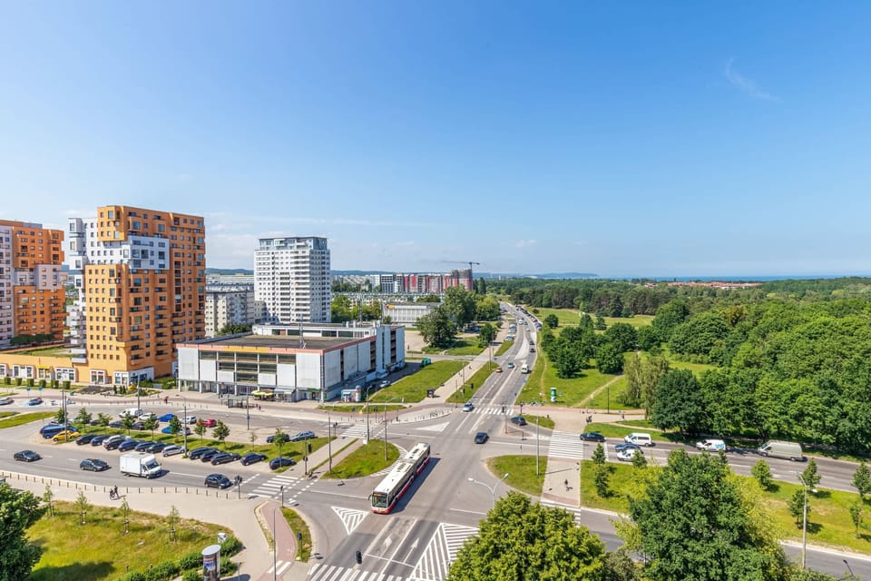 Surrounding city and green areas, which can be admired from the furnished balcony.