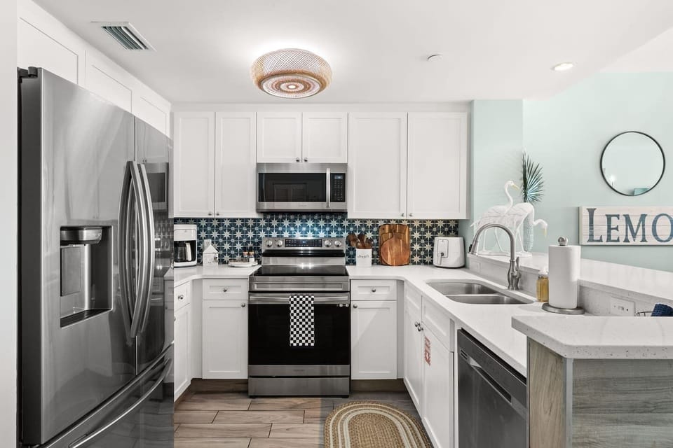 Fully stocked Chef's kitchen with stainless steel Samsung appliances