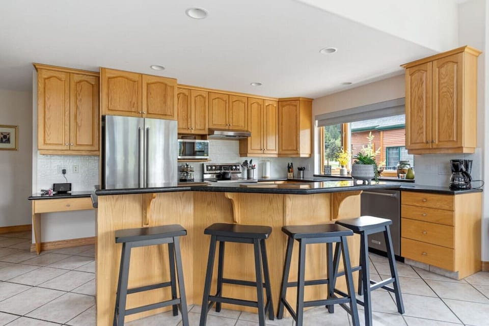 Full kitchen with a crockpot, kettle, drip coffee machine, ground coffee, tea, sugar and basic condiments (ketchup, mustard and relish.)