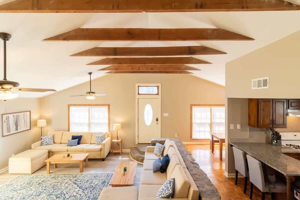 View of the living and dining area with an amazing ceiling