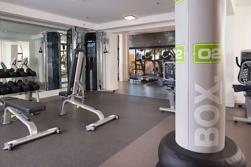 Build strength comfortably with spacious weight training and mirrors.