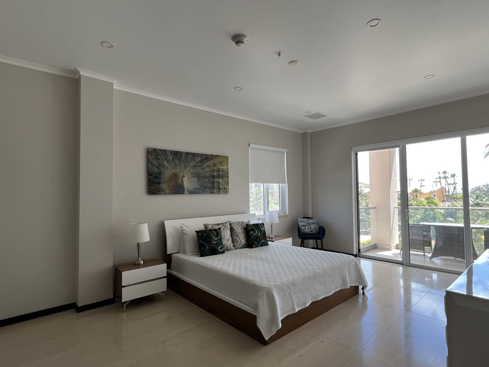 Spacious Master Bedroom with Balcony access to gorgeous views.