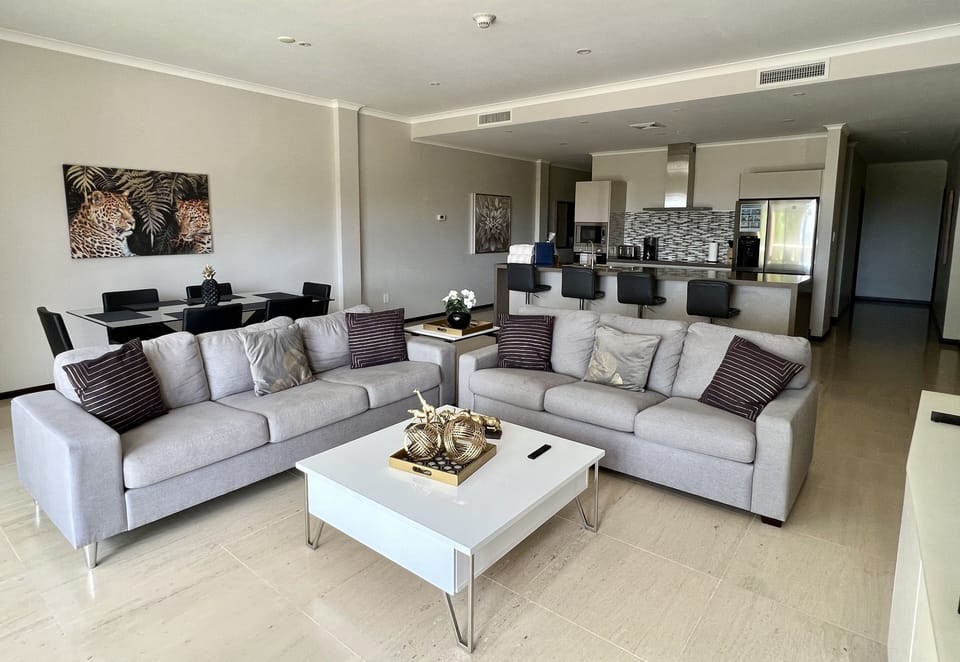 Stunning condo living in Aruba.  This living room has a pull-out sofa bed.