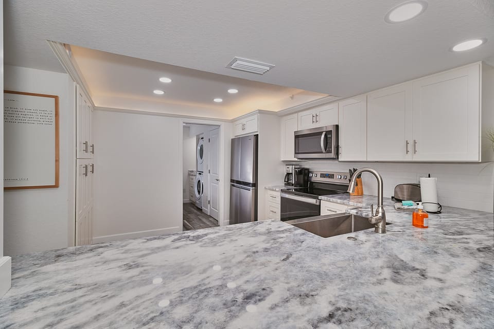 Plenty of prep space and top-tier appliances make home-cooked meals enjoyable and easy.
