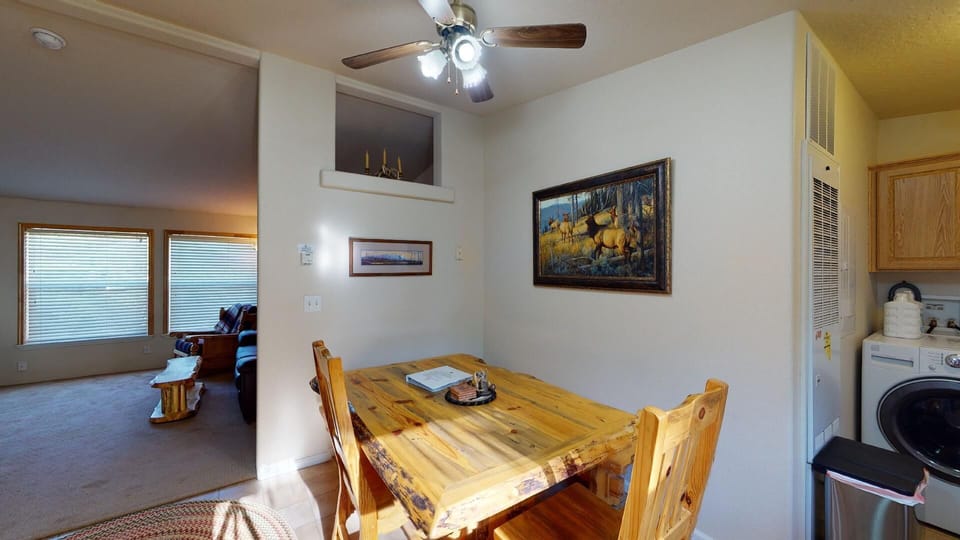 Dining table located next to the kitchen.