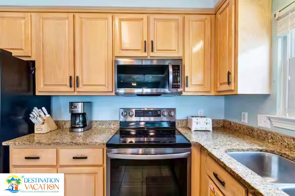 Classic cabinetry adds warmth to the culinary space.
