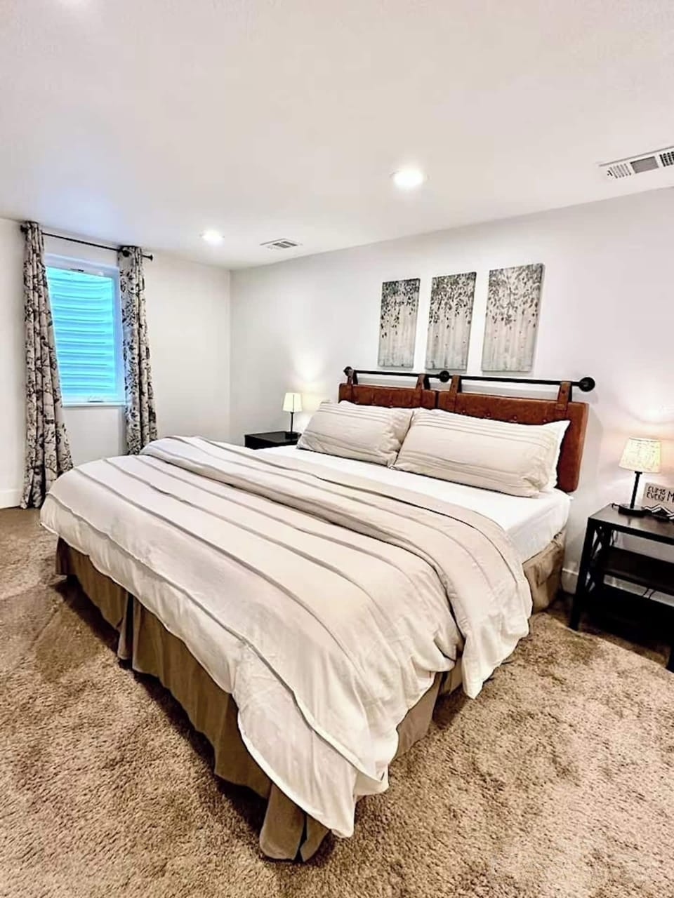 Escape to your own private oasis lower level master bedroom with a beautifully appointed ensuite bath.