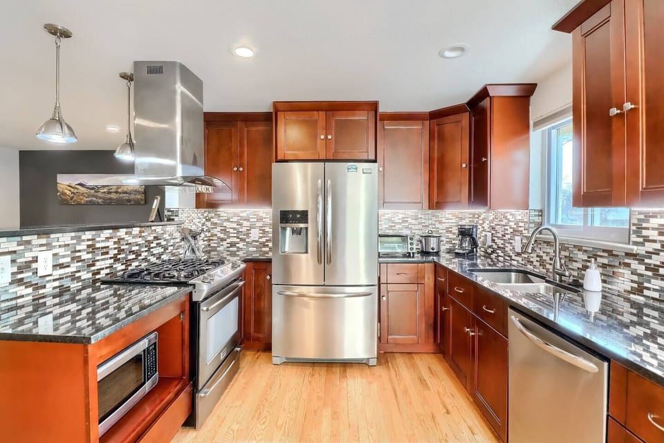 The beautifully updated kitchen provides ample room for your entire group to cook and entertain.