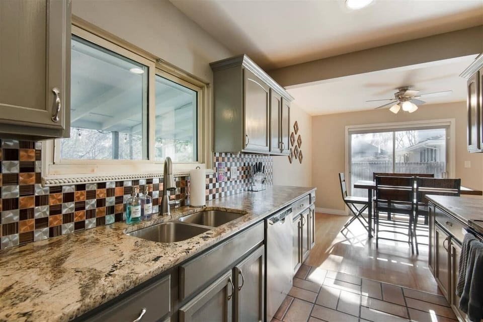 The equipped galley kitchen comes with stainless steel appliances and all the essentials you need for your stay.