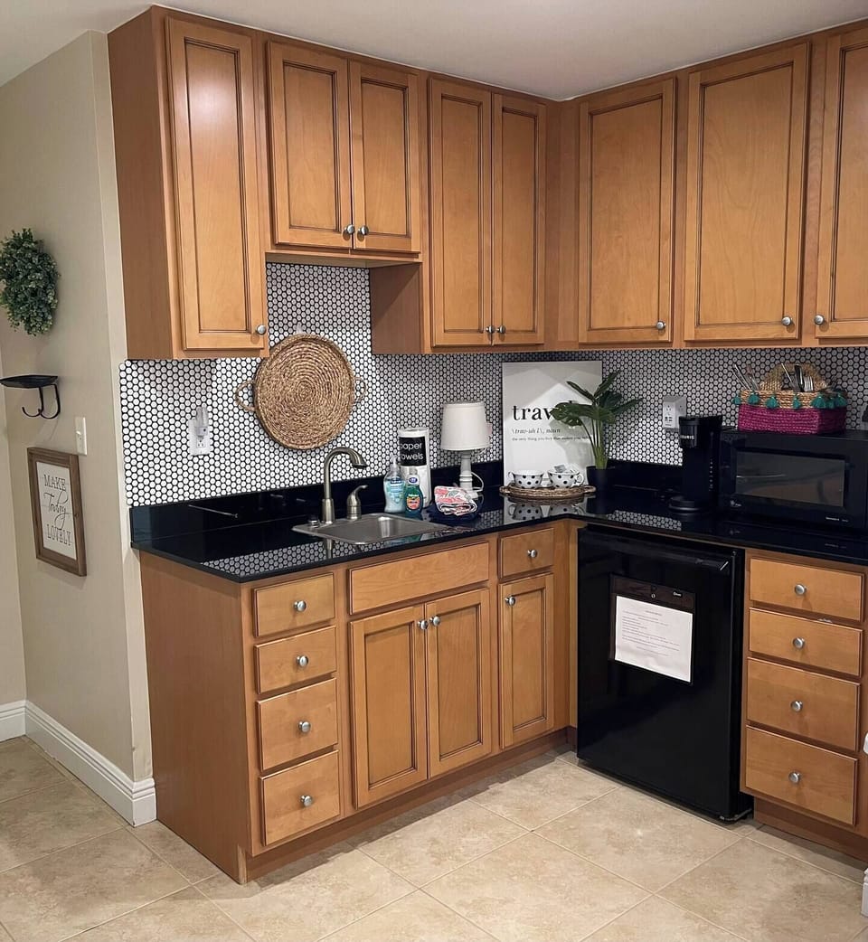 The kitchenette area.  It has a dorm refrigerator, microwave and coffee maker.  This small unit is perfect for solo travel or romantic getaway for 2.  