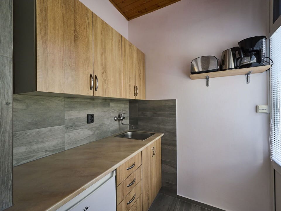 Cabinetry, Property, White, Building, Wood, Countertop, Lighting, Drawer, Sink, Interior Design