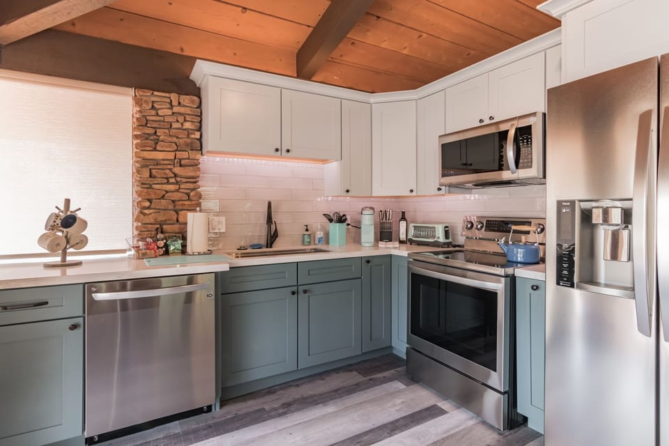 Enjoy the Keurig and all needed appliances in the spacious and stocked kitchen.  Make your favorite meal or use the space to make a great cup of coffee to enjoy on the wraparound deck.