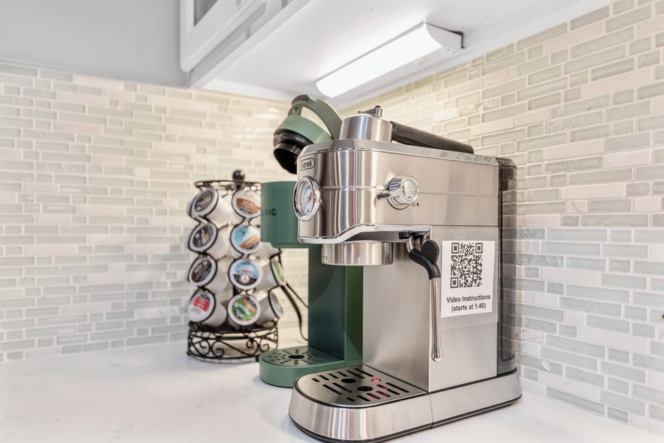 Coffee bar with espresso, press, drip, teas, and all the fixins you need.