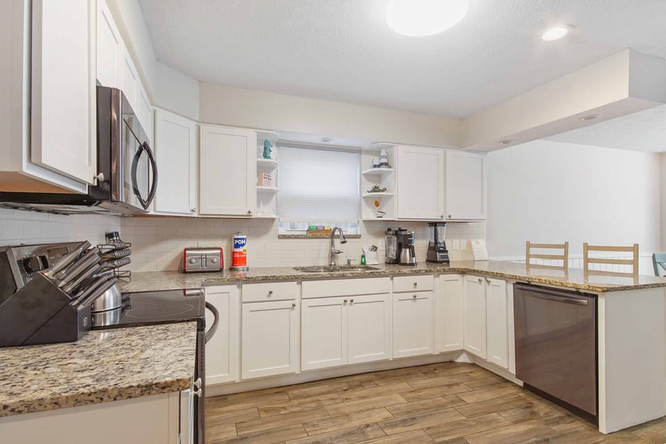 The kitchen is fully stocked with new cookware, Keurig, knife set and more!