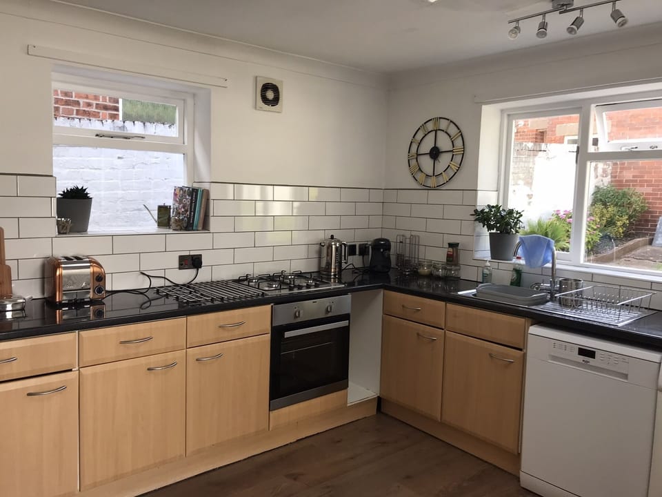 Fully equipped kitchen including new dishwasher and coffee pod machine.