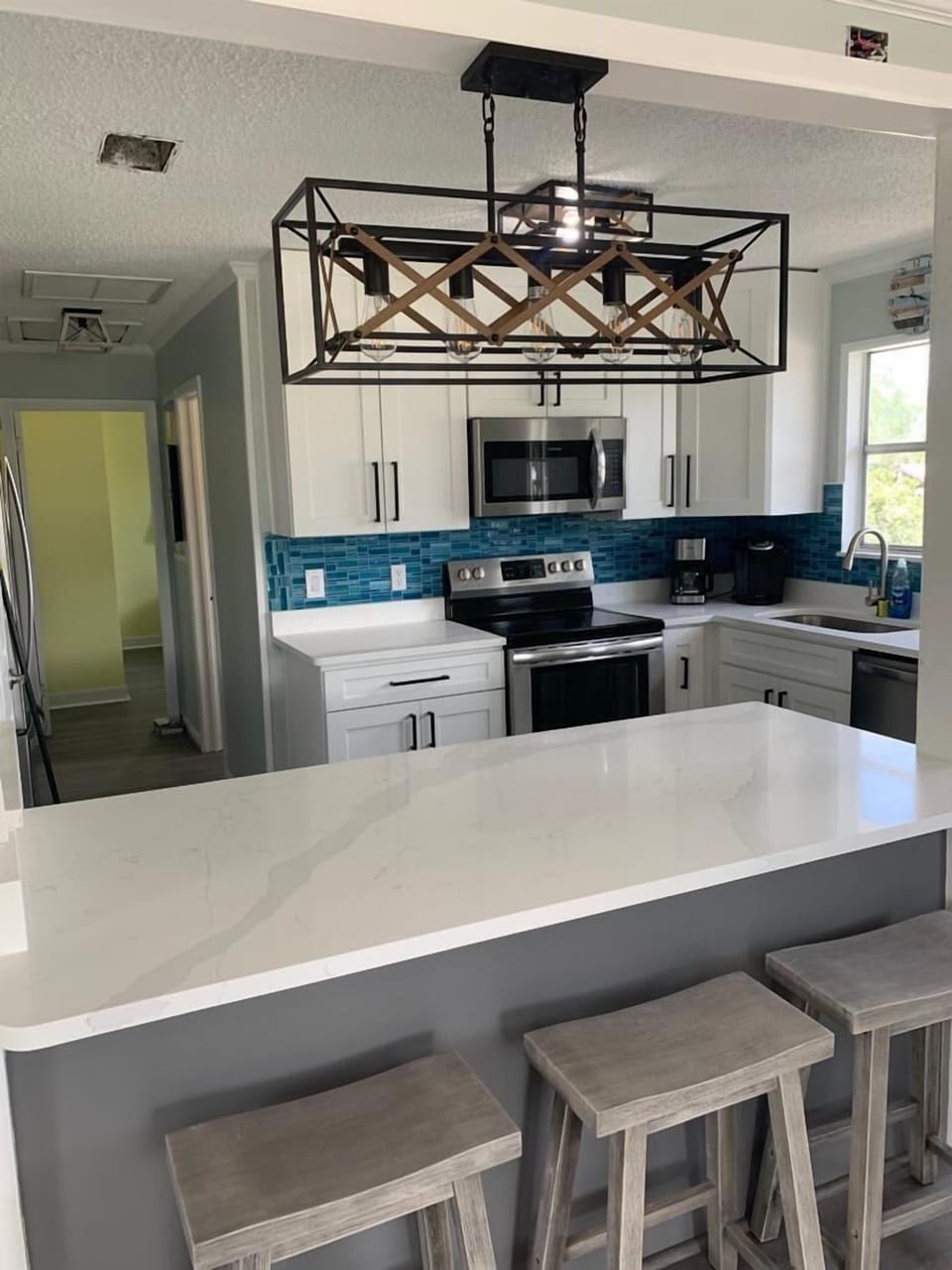 Kitchen with all of the essentials to cook your meals! - Second Floor