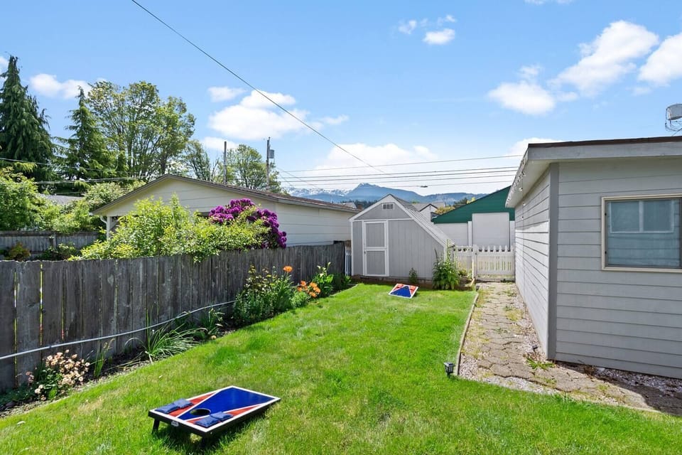Enjoy a game of cornhole with the mountain view backdrop.