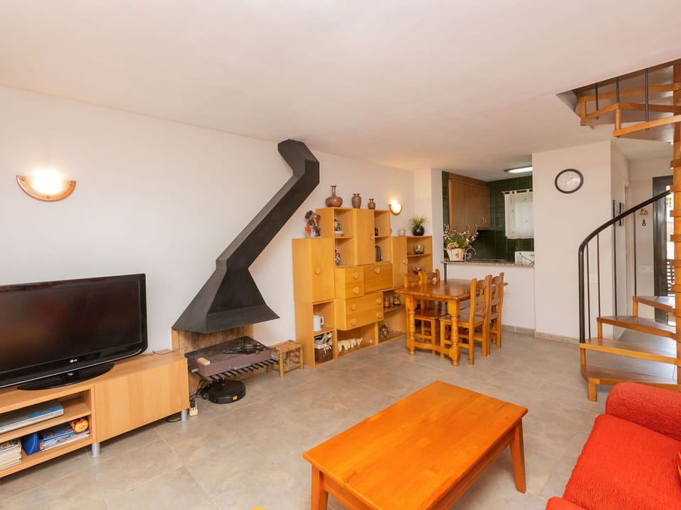Furniture, Table, Building, Couch, Wood, Comfort, Lighting, Bookcase, Orange, Flooring