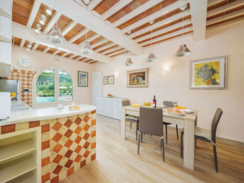 Furniture, Property, Cabinetry, Table, Picture Frame, Wood, Interior Design, Flooring, Living Room, Floor