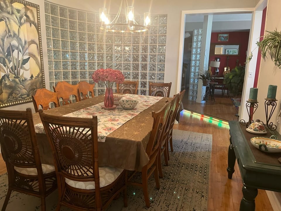 Dining room table can expand to seat 16 comfortably with plenty of linens.