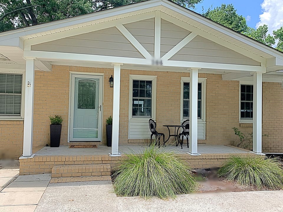 The front porch is a great spot to have a cup of coffee and relax. 