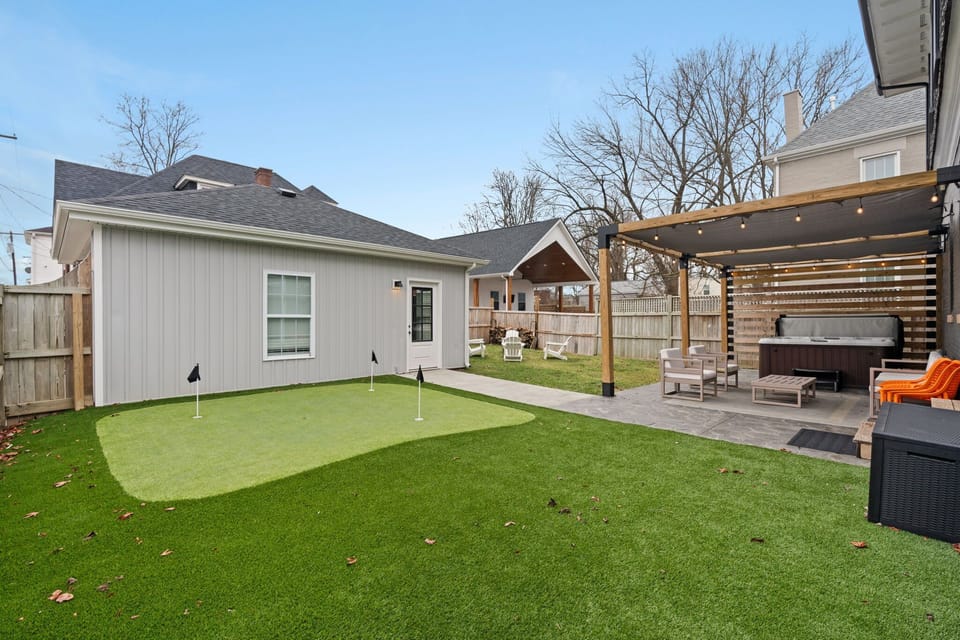 Settle a putting contest on the backyard green between hot tub soaks - the kind of low-key competition that runs all weekend.