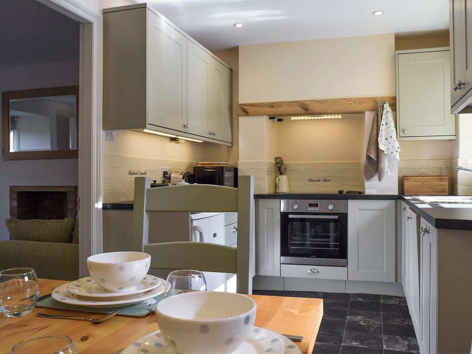 Dining area within kitchen | Wells Cottage, Hook Norton, near Chipping Norton