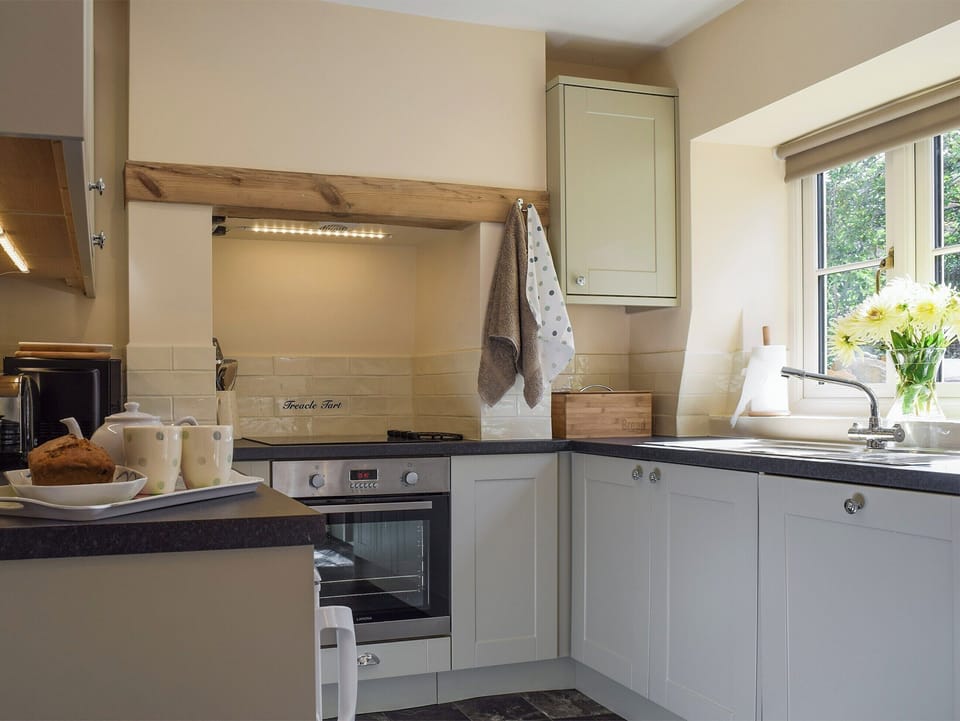 Well-equipped fitted kitchen | Wells Cottage, Hook Norton, near Chipping Norton
