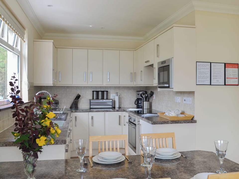 Well equipped kitchen/ dining area | Shoreside - Mullardoch Cottages, by Inverinate, Kyle