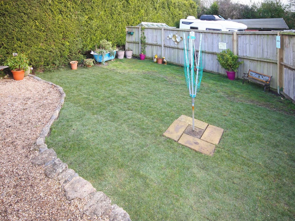 Garden with sitting out area and childrens games | The Cider Press, Watton, near Bridport