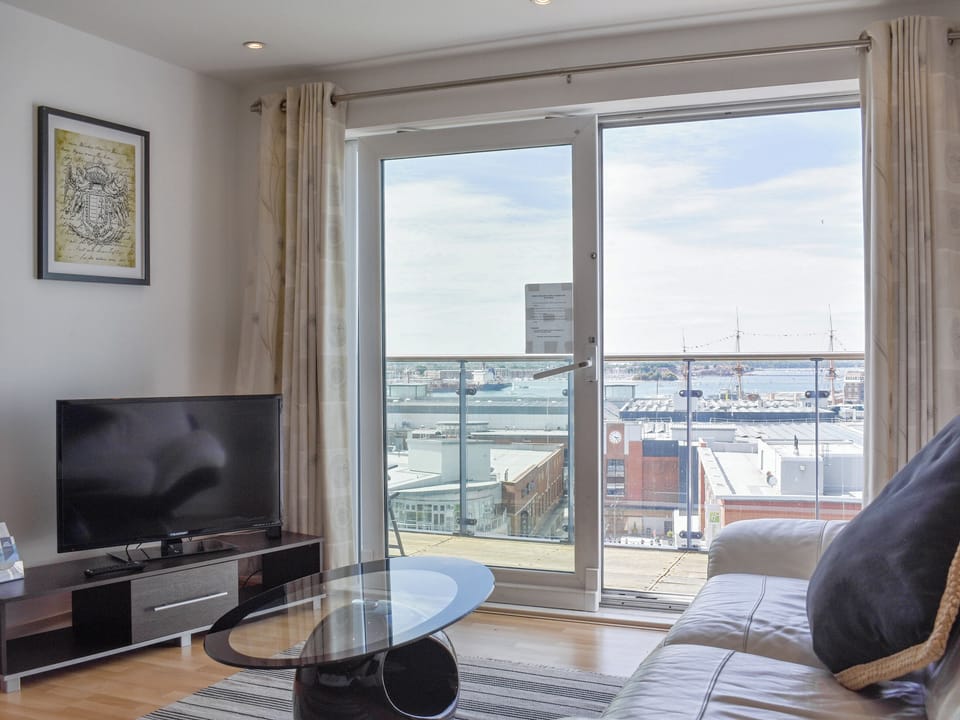 Welcoming living area with access to balcony | Gunwharf Quays Apartments - The Two Bedroom Balcony View &rsquo;A&rsquo; - Gunwharf Quays Apartments , Gunwharf Quays, near Portsmouth