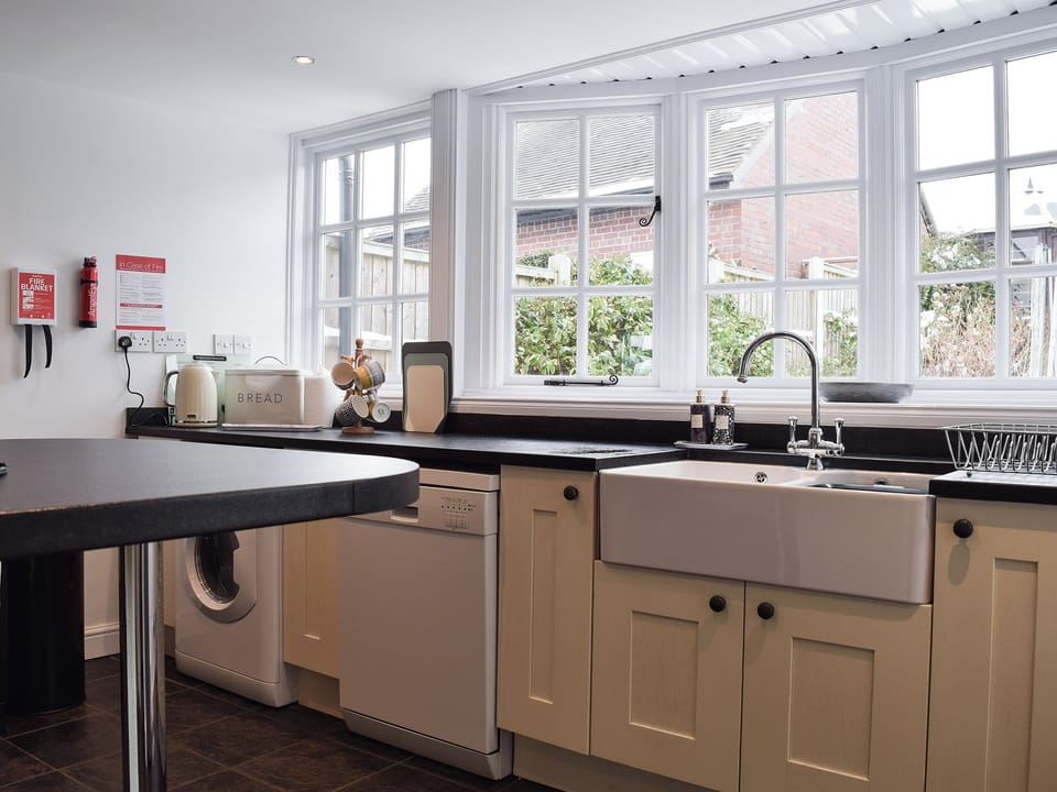 Kitchen with Belfast sink | Three Batch Cottages, Chaddesley Corbett, near Bromsgrove