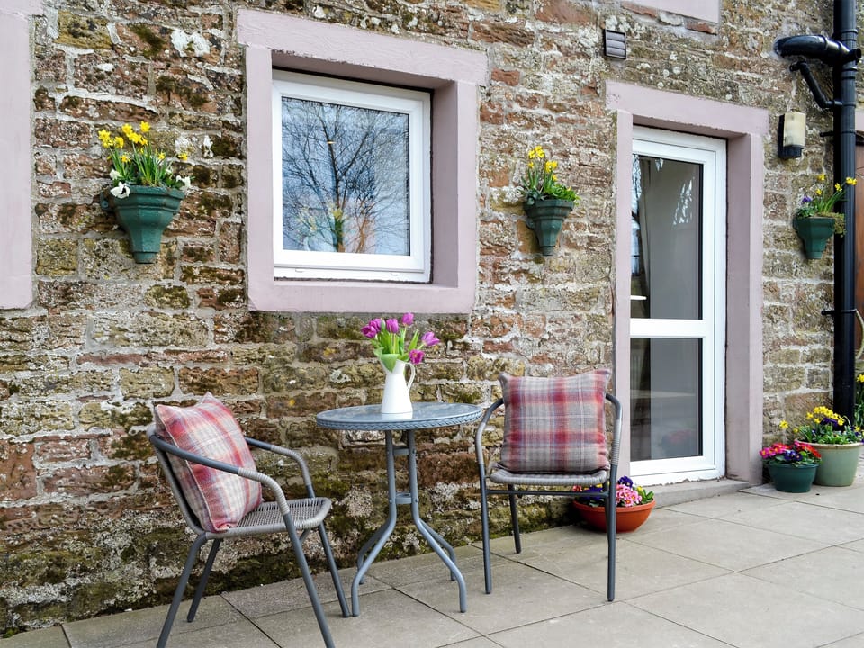 Sitting-out-area | Farmhouse Cottage - Wallace Lane Farm Cottages, Brocklebank, near Caldbeck and Uldale
