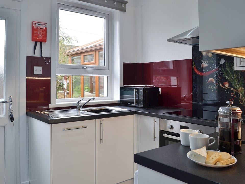 Kitchen with direct access to the rear garden | Rocky Mountain View, Glencoe