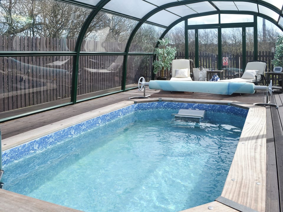 Covered, heated plunge pool | Bodrydd - Bodrydd, Rhoshirwaun, near Pwllheli