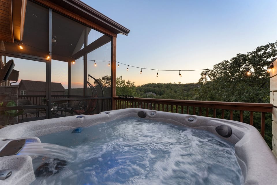 Watch the sunset over the Ozark mountains while soaking in the private hot tub on the back deck!