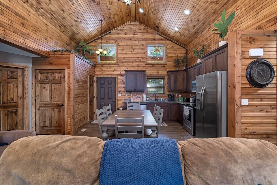 The open concept kitchen and living room create a spacious area for your whole group. 
