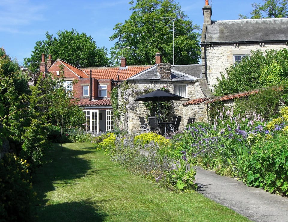 Garden in bloom | Eden House Holiday Cottage, Pickering