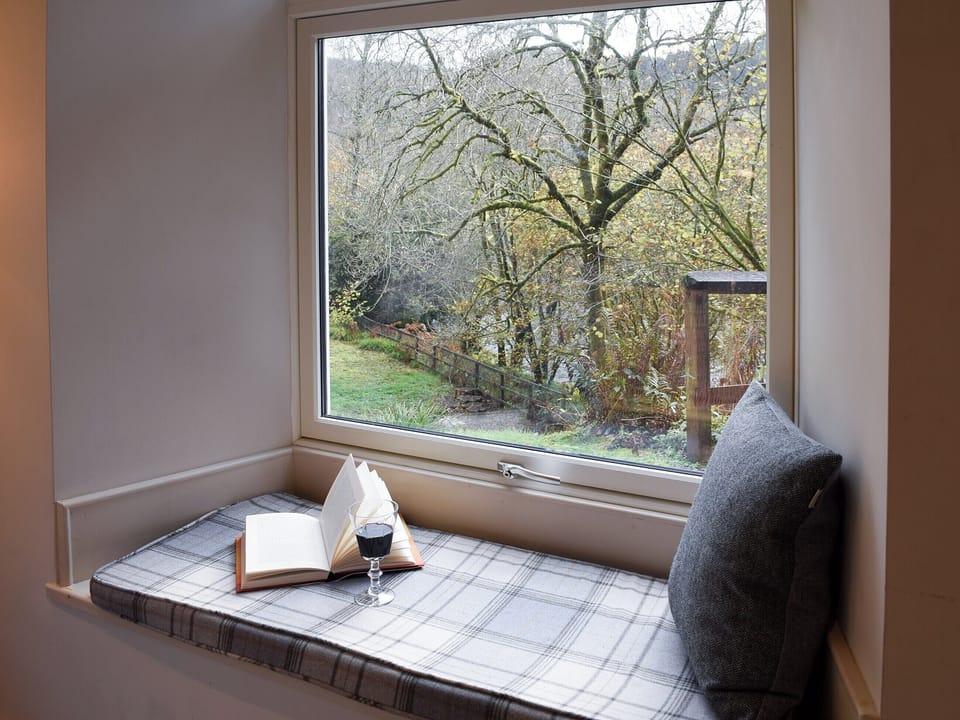 Window seat with great views | Craigmuick Cottage, Aberfoyle