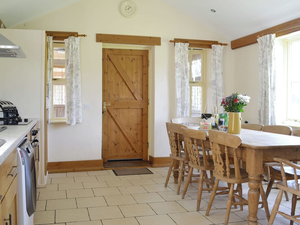 Well-equipped kitchen with dining area | Four Bays - Struncheon Hill Farm, Brandesburton, near Bridlington