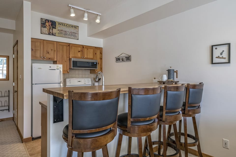 Kitchen with Live Edge Breakfast Bar 