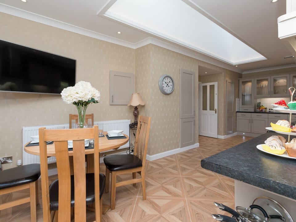 Kitchen with dining area | Hillend Farm House - Hillend, Dalry