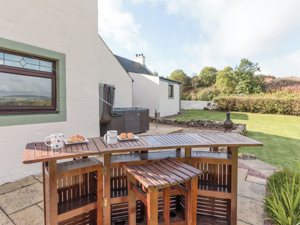 Lawned garden with sitting-out area, garden furniture and hot tub | Hillend Farm House - Hillend, Dalry