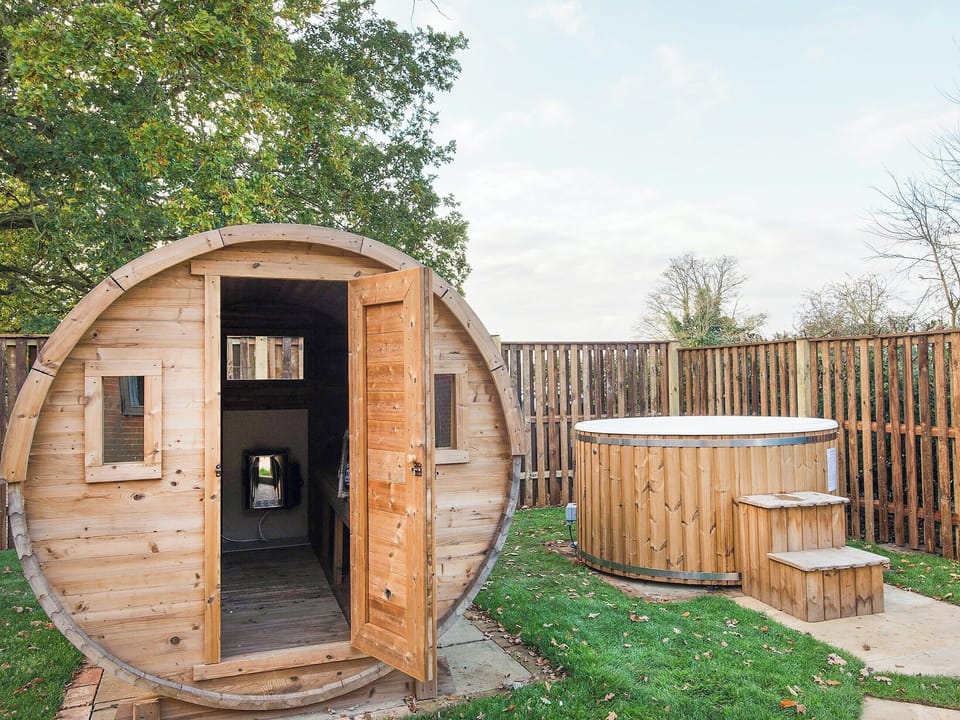 Hot tub and sauna | Meadowsweet Cottage - Swardeston Cottages, Swardeston, near Mulbarton