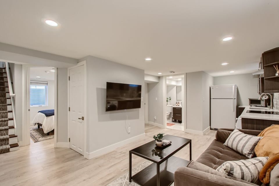 Lower level living area / media room with 50 inch Roku Smart TV